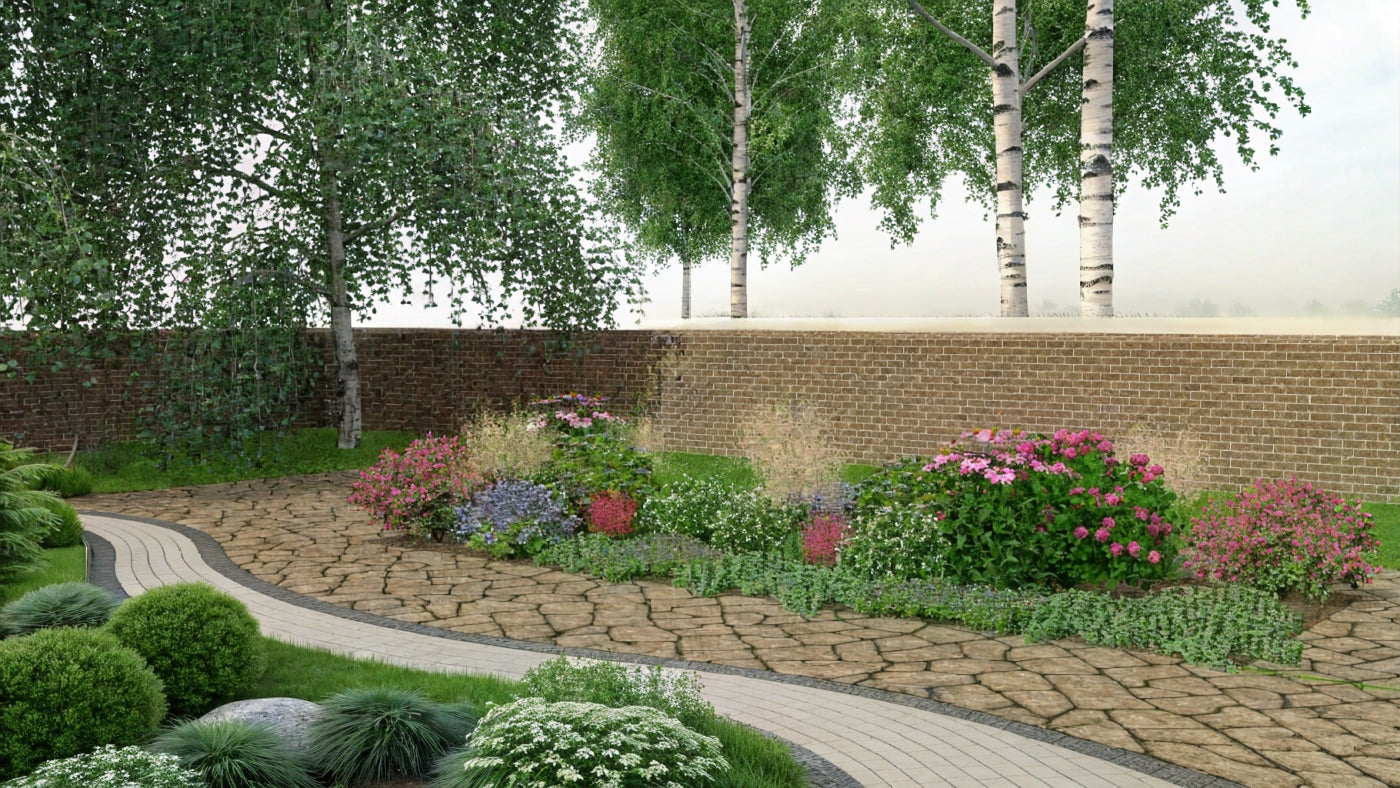 Summer display of the perennial bed with flowering hydrangeas, spireas, and bellflowers in shades of pink and purple, complemented by ornamental grasses along a garden path