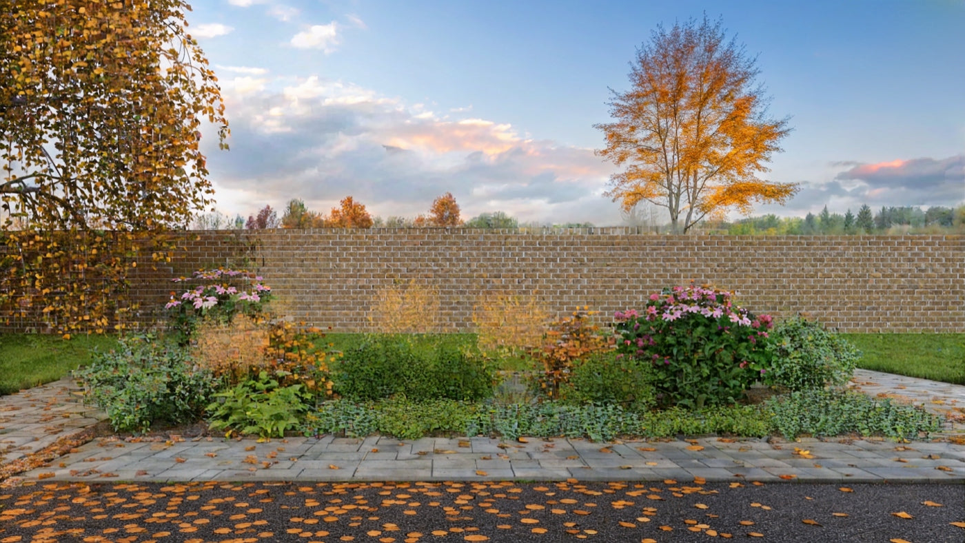 The autumn arrangement highlights the decorative qualities of the grasses and late-flowering hydrangeas - copper plumes of tufted hair grass and the last perennial blooms create a warm color palette